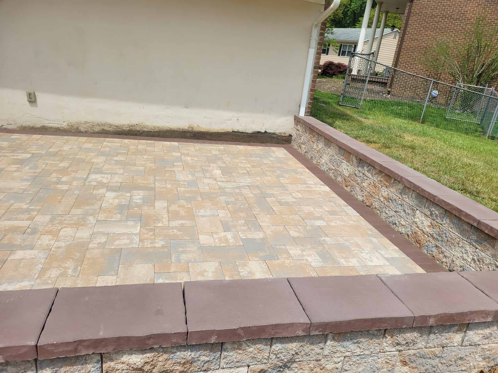 Up Close Shot of Eye-Catching Walkway Pavers Project Surrounded by Retaining Walls