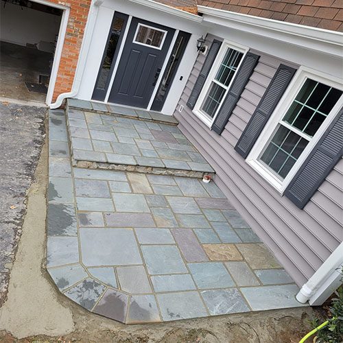 Finished Walkway Flagstone Step Pavers Leading Into Entrance of Home
